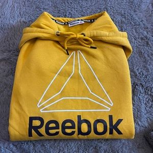 Yellow rebook sweater. hardly worn